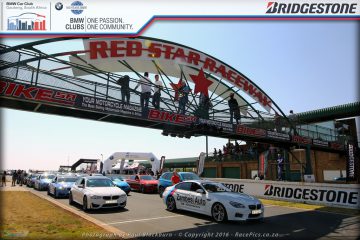 Cars forming up on Red Star Raceway grid for parade